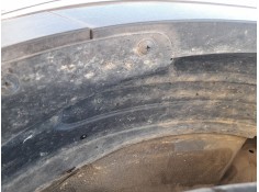 PLASTICO PASE RUEDA DEL. DCH. 868123U000 