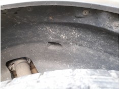PLASTICO PASE RUEDA TRAS. IZQ. 6F9810969D 