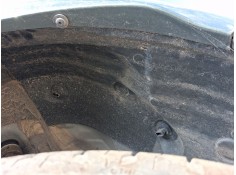 PLASTICO PASE RUEDA TRAS. IZQ. 767495315R 