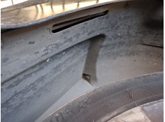 PLASTICO PASE RUEDA DEL. IZQ. 52126645 