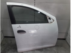 PUERTA DELANTERA DERECHA 801008681R TOCADA 