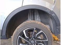PLASTICO PASE RUEDA TRAS. IZQ. 11115348 