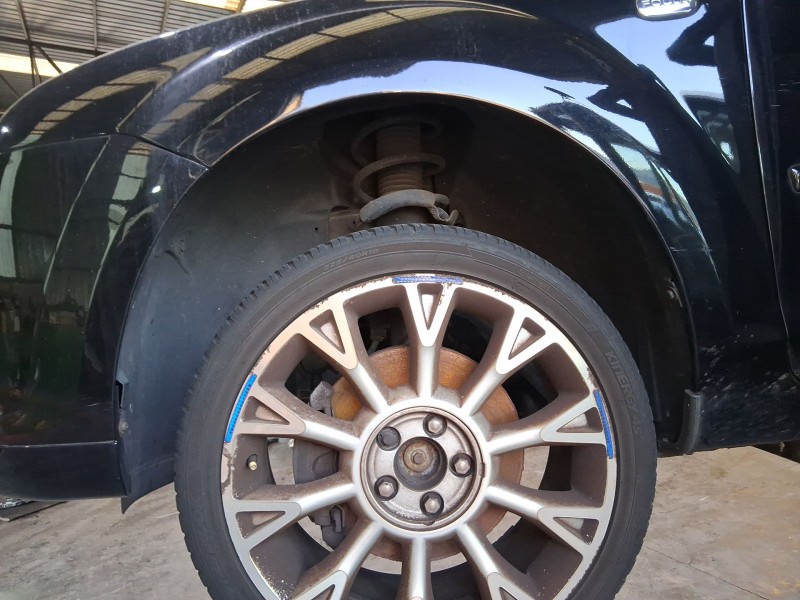 Recambio de plastico pase rueda del. izq. para ford focus ii descapotable 2.0 referencia OEM IAM 2821192  