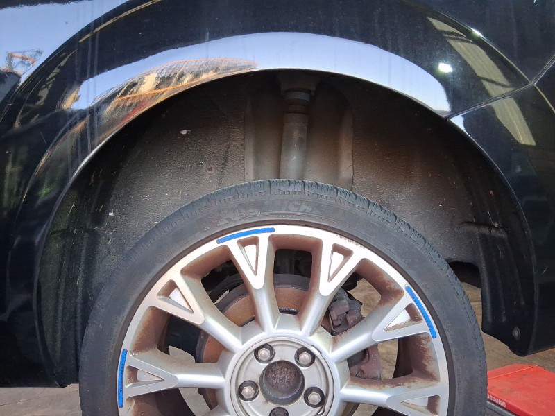 Recambio de plastico pase rueda tras. izq. para ford focus ii descapotable 2.0 referencia OEM IAM 1406869  