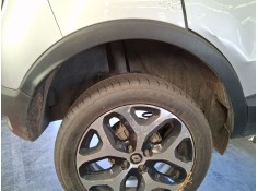 PLASTICO PASE RUEDA TRAS. DCH. 767480587R 