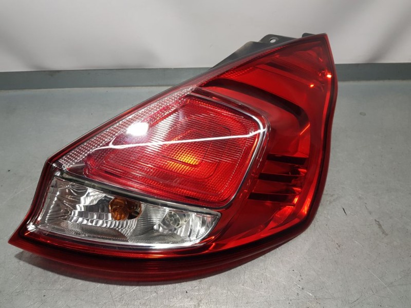 Recambio de piloto trasero derecho para ford fiesta (ccn) ambiente referencia OEM IAM 1877010  ROZADO