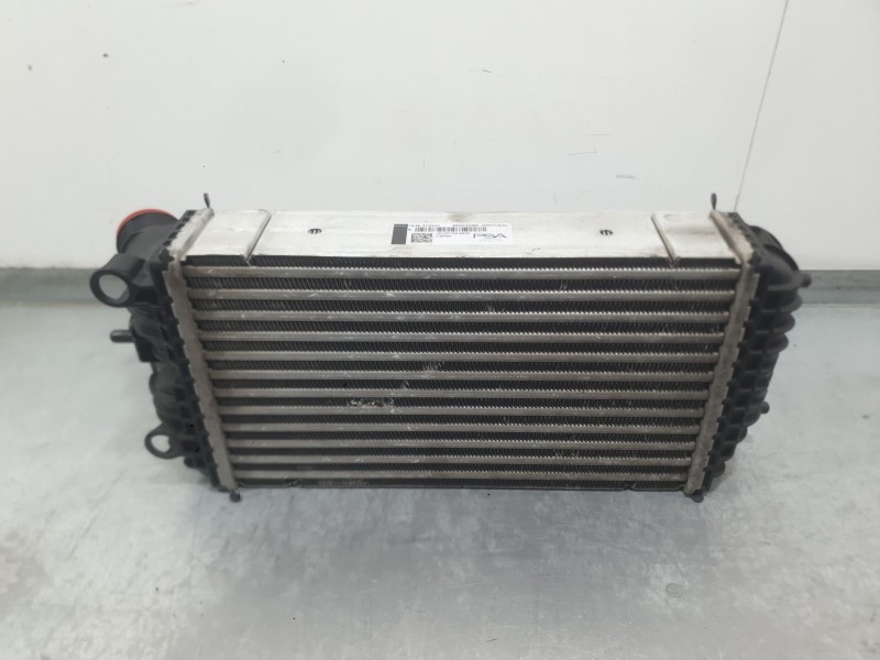 Recambio de intercooler para opel corsa f (p2jo) 1.2 (68) referencia OEM IAM 9824742280  
