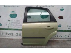 PUERTA TRASERA IZQUIERDA TOCADA