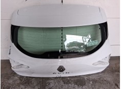 PORTON TRASERO 901009697R TOCADO 