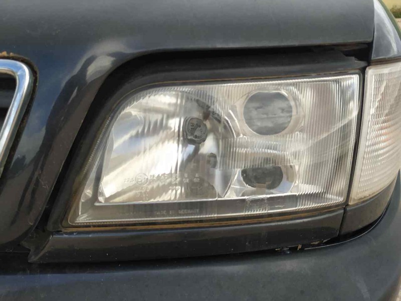 Recambio de faro izquierdo para audi a6 berlina (c4) 2.5 tdi referencia OEM IAM 4A0941029N  