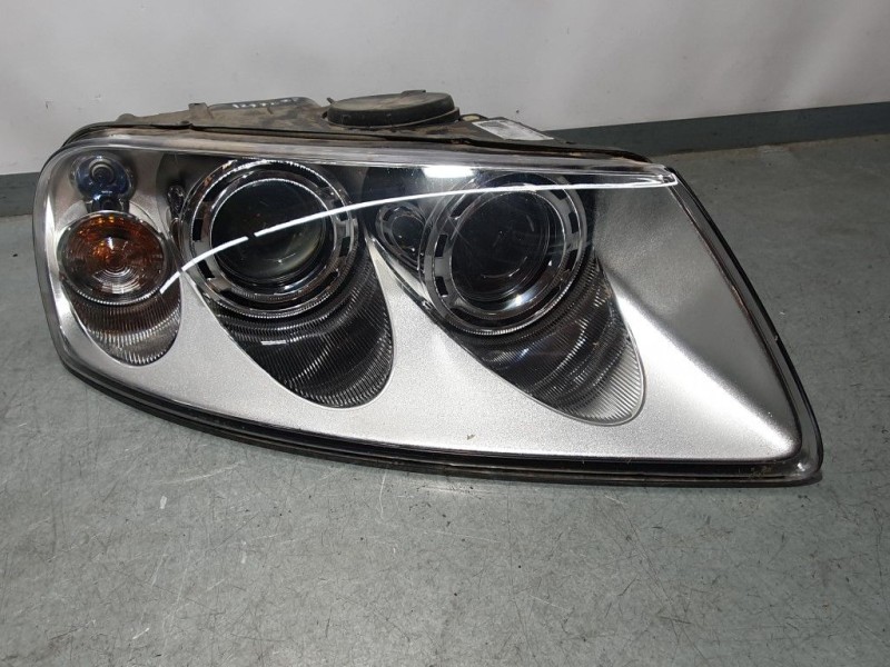 Recambio de faro derecho para volkswagen touareg (7la) tdi v10 referencia OEM IAM 89307869  VALEO XENON PETAÑA ROTA