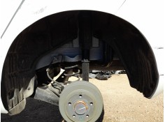 PLASTICO PASE RUEDA TRAS. IZQ. 11203086 