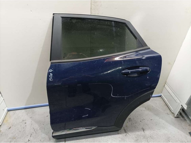 Recambio de puerta trasera izquierda para ford puma hybrid titanium referencia OEM IAM 2405669  