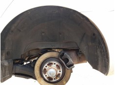 PLASTICO PASE RUEDA TRAS. IZQ. 767496912R 