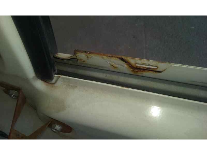 Recambio de puerta delantera derecha para nissan atleon chasis cabina referencia OEM IAM  TOCADA 