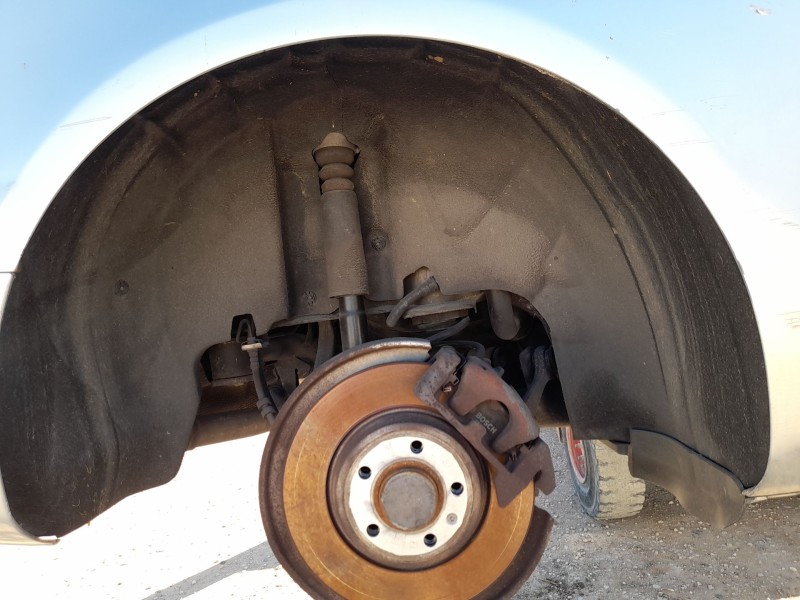 Recambio de plastico pase rueda tras. dch. para audi a5 (8t3) 2.7 tdi referencia OEM IAM 8T0810172G  