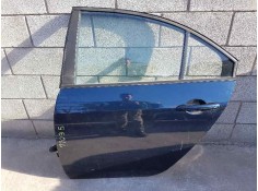 PUERTA TRASERA IZQUIERDA TOCADA