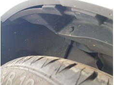 PLASTICO PASE RUEDA TRAS. IZQ. 6563802080 